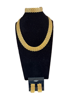 Gold tone three piece necklace, bracelet, and earrings set